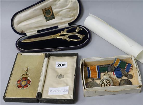 A group of WWI medals, Coronation enamel medal etc
